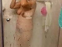 Asian wife showering