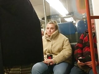 Young blonde girl cant take her eyes of bulge in train